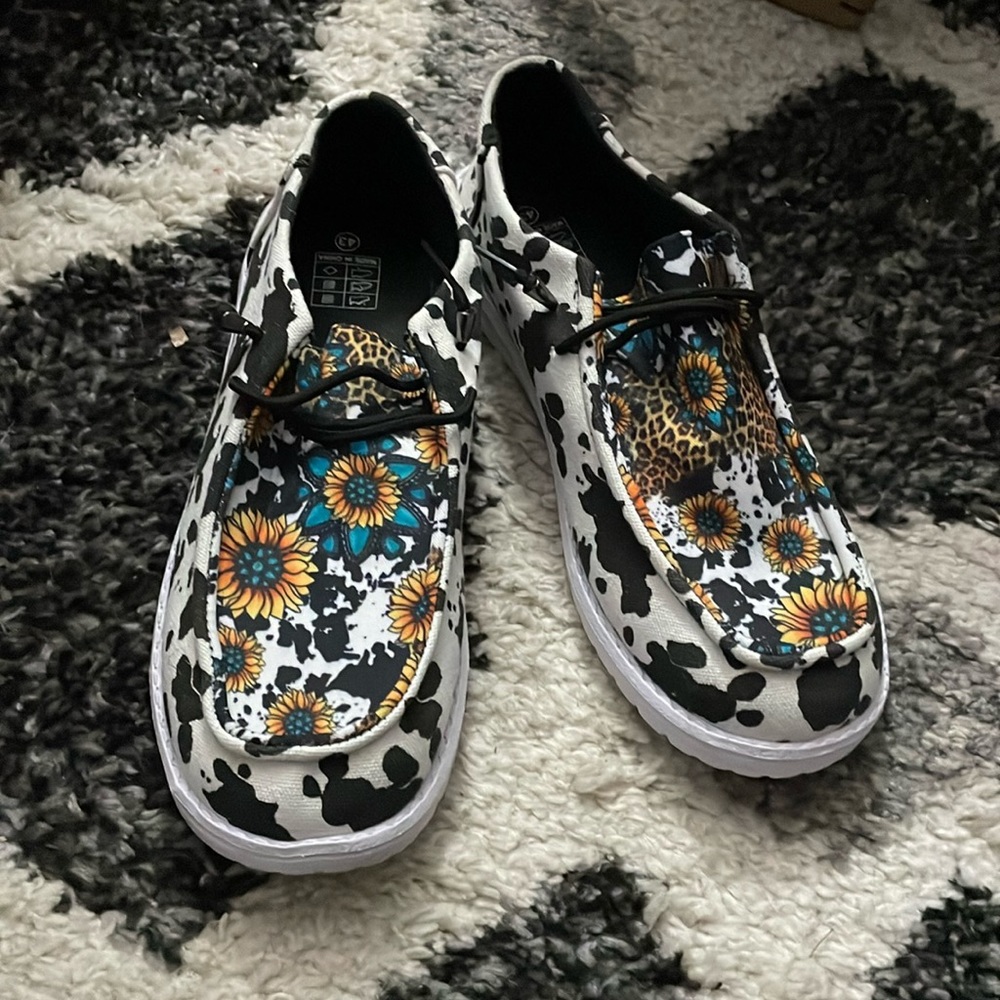 Hey dudes, cow print with cheetah print and sunflower’s on them.